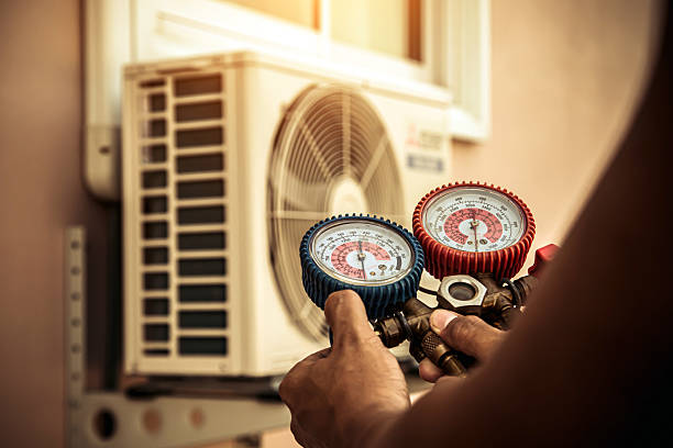 Professional Heat Pump Repair technician working in Scappoose, OR